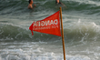 AYIA NAPA, CYPRUS – OCTOBER 19:A red 'Danger For Swimming' flag is seen at Glyki Nero Bea...