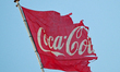 AYIA NAPA, CYPRUS – OCTOBER 19:A partially destroyed Coca-Cola flag is seen in Ayia Napa,...