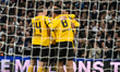 Ramy Bensebaini of Borussia Dortmund celebrates scoring his team's second goal after a pen...