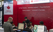 Visitors tour the CANADA Semiconductor booth at the Korea Semiconductor Exhibition (SEDEX...