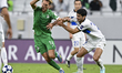 Michel Vlap of Al Ahli SC and Guychmyrat Annagulyyev of FK Arkadag are in action during th...
