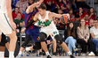Edgaras Ulanovas of Zalgiris Kaunas is in action with Tornike Shengelia of FC Barcelona du...