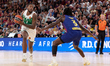 Moses Wright of Zalgiris Kaunas is in action with Myles Cale of FC Barcelona during the Eu...