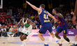 Sylvain Francisco of Zalgiris Kaunas competes with Joel Parra of FC Barcelona during the E...