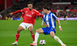 Dan Ndoye of Nottingham Forest battles with Gabri Veiga of FC Porto during the UEFA Europa...