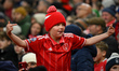 A young Forest fan gestures towards the Porto fans during the UEFA Europa League League St...