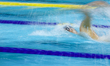 A swimmer races towards the finish line at the World Aquatics Swimming World Cup 2025 at t...