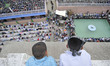Kids watching from top roof as Nepalese Muslim ready to offer ritual prayer at Kashmari Ja...