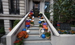A closeup of Halloween decorations dressed as the New York Knicks is outside an apartment...