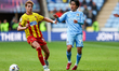 Hector Kyprianou of Watford FC and Tatsuhiro Sakamoto of Coventry City are in action durin...