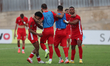 Valletta players celebrate after the YoHealth Malta Premier League soccer match between Va...