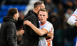 Manager Ian Evatt of Blackpool congratulates Andy Lyons of Blackpool after the final whist...