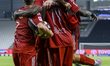 Players of Al Arabi SC celebrate after scoring a goal during the Doha Bank Stars League Qa...