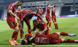 Wassem Keddari of Al Arabi SC celebrates with his teammate after scoring a goal during the...