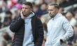 Rob Edwards, the Middlesbrough Manager, discusses his options with Harry Watling during th...