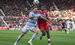 Kaly Sene of Middlesbrough challenges for the ball with Dan Scarr of Wrexham during the Sk...