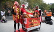 A hot food cart selling hot dogs is called ''Otto and Mocca'' poses for a photo during the...