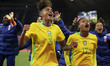 Tarciane #3 of Brazil and Ariadina Alves #17 of Brazil celebrate at full time during the I...