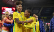 Tarciane #3 of Brazil and Ariadina Alves #17 of Brazil celebrate at full time during the I...