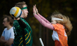 Players from the Lodz SkyWeavers (in orange) compete against the Krakow Dragons (green) du...
