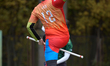 Players from the Lodz SkyWeavers (in orange) compete against the Krakow Dragons (green) du...