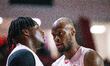 Elisee Assui of Openjob Metis Varese and Taze Moore of Openjob Metis Varese participate in...