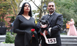 The Adams Family pose for a photo during the Washington Square Park Halloween Dog Parade i...