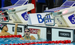 Kate Douglass celebrates her victory and world record time at the Women's 100m Freestyle F...