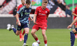 Kristian Hlynsson of FC Twente and James McConnel of AFC Ajax play during the match betwee...