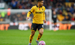 Joao Gomes of Wolverhampton Wanderers is in attacking action with the ball during the Prem...