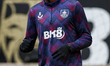 Lesley Ugochukwu of Burnley FC warms up during the Premier League match between Wolverhamp...
