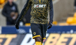 Marshall Munetsi of Wolverhampton Wanderers warms up during the Premier League match betwe...