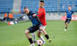 Krystian Wachowiak and Maciej Kuziemka play during the game between Wisla Krakow and Stal...