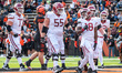 DJ Gordon, 18, celebrates a touchdown for the Harvard Crimson during an NCAA Football Cham...
