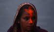 Nepali Hindu devotees perform rituals at Gaurighat riverbank in Kathmandu, Nepal, on Octob...