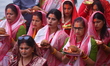 Nepali Hindu devotees perform rituals at Gaurighat riverbank in Kathmandu, Nepal, on Octob...