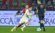 Nicola Zalewski of Atalanta BC competes for the ball with Jari Vandeputte of US Cremonese...