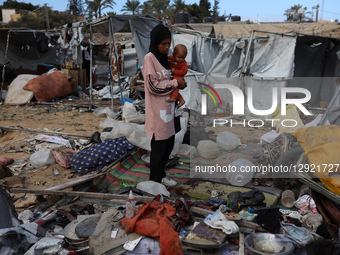 Displaced Palestinians check the remains of a tent that is destroyed in an Israeli strike in Deir el-Balah, Gaza Strip, on October 29, 2025.... by Majdi Fathi/NurPhoto