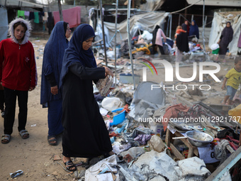 Displaced Palestinians check the remains of a tent that is destroyed in an Israeli strike in Deir el-Balah, Gaza Strip, on October 29, 2025.... by Majdi Fathi/NurPhoto