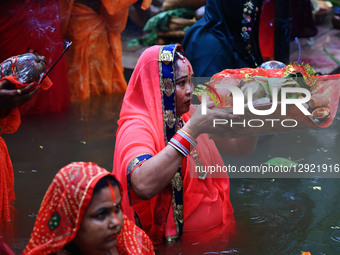 Hindu women devotees worship the Sun god at the Shrine Galta Ji Temple 'Kund' during the 'Chhath Puja' festival in Jaipur, Rajasthan, India,... by Vishal Bhatnagar/NurPhoto