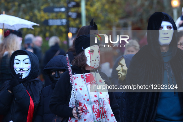 Performers in costumes participate in the Lassemajas ghost parade in Gamla Linkoping, Sweden, on October 29, 2025.  by Pradeep Dambarage/NurPhoto