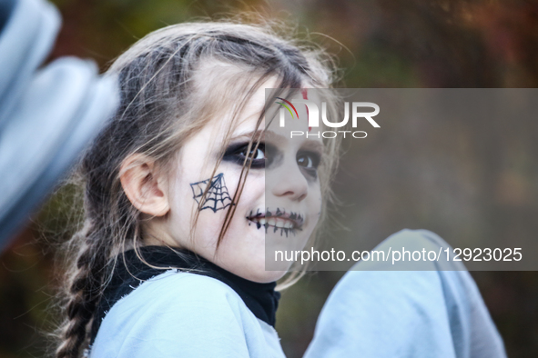 A performer in a costume participates in the Lassemajas ghost parade in Gamla Linkoping, Sweden, on October 29, 2025.  by Pradeep Dambarage/NurPhoto