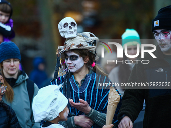 Performers in costumes participate in the Lassemajas ghost parade in Gamla Linkoping, Sweden, on October 29, 2025.  by Pradeep Dambarage/NurPhoto