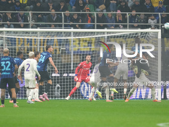 Yann Bisseck of FC Internazionale hits the ball during the soccer match between FC Internazionale and ACF Fiorentina, MD9 of Serie A Enilive... by Roberto Tommasini/NurPhoto