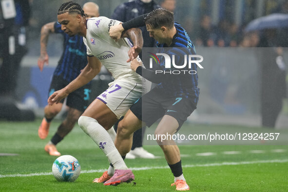 Cher Ndour of ACF Fiorentina and Piotr Zielinski duel during the soccer match between FC Internazionale and ACF Fiorentina, MD9 of the Serie... by Roberto Tommasini/NurPhoto