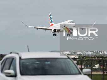 An American Eagle airplane lands at Miami International Airport in Miami, Florida.  by Ronen Tivony/NurPhoto