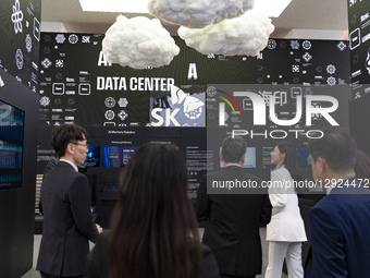 Visitors tour and experience exhibits at SK hynix's exhibition booth at the K-Tech Showcase, a side event of the APEC CEO Summit, in Gyeongj... by Chris Jung/NurPhoto