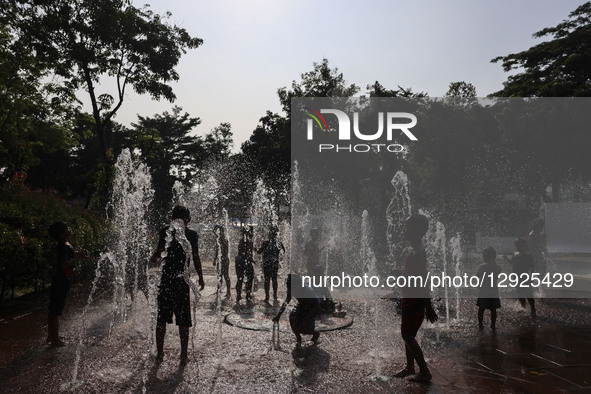 Children play at a public park fountain during hot weather in Jakarta, Indonesia, on October 19, 2025. Indonesia's Meteorology, Climatology,... by Agoes Rudianto/NurPhoto