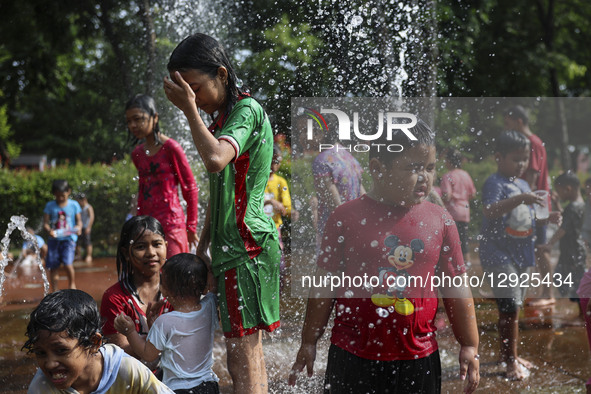 Children play at a public park fountain during hot weather in Jakarta, Indonesia, on October 19, 2025. Indonesia's Meteorology, Climatology,... by Agoes Rudianto/NurPhoto