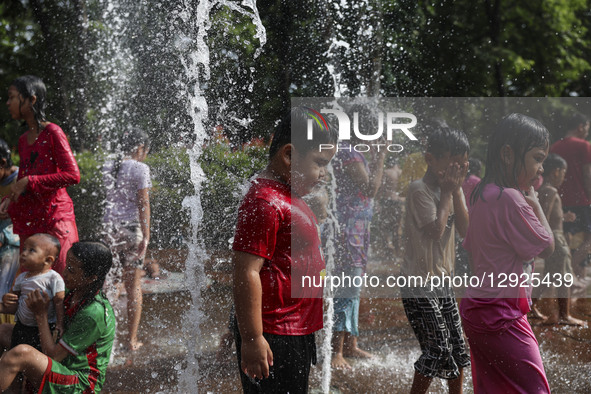 Children play at a public park fountain during hot weather in Jakarta, Indonesia, on October 19, 2025. Indonesia's Meteorology, Climatology,... by Agoes Rudianto/NurPhoto